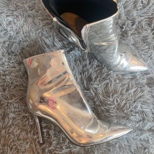Thalia Sodi silver booties.